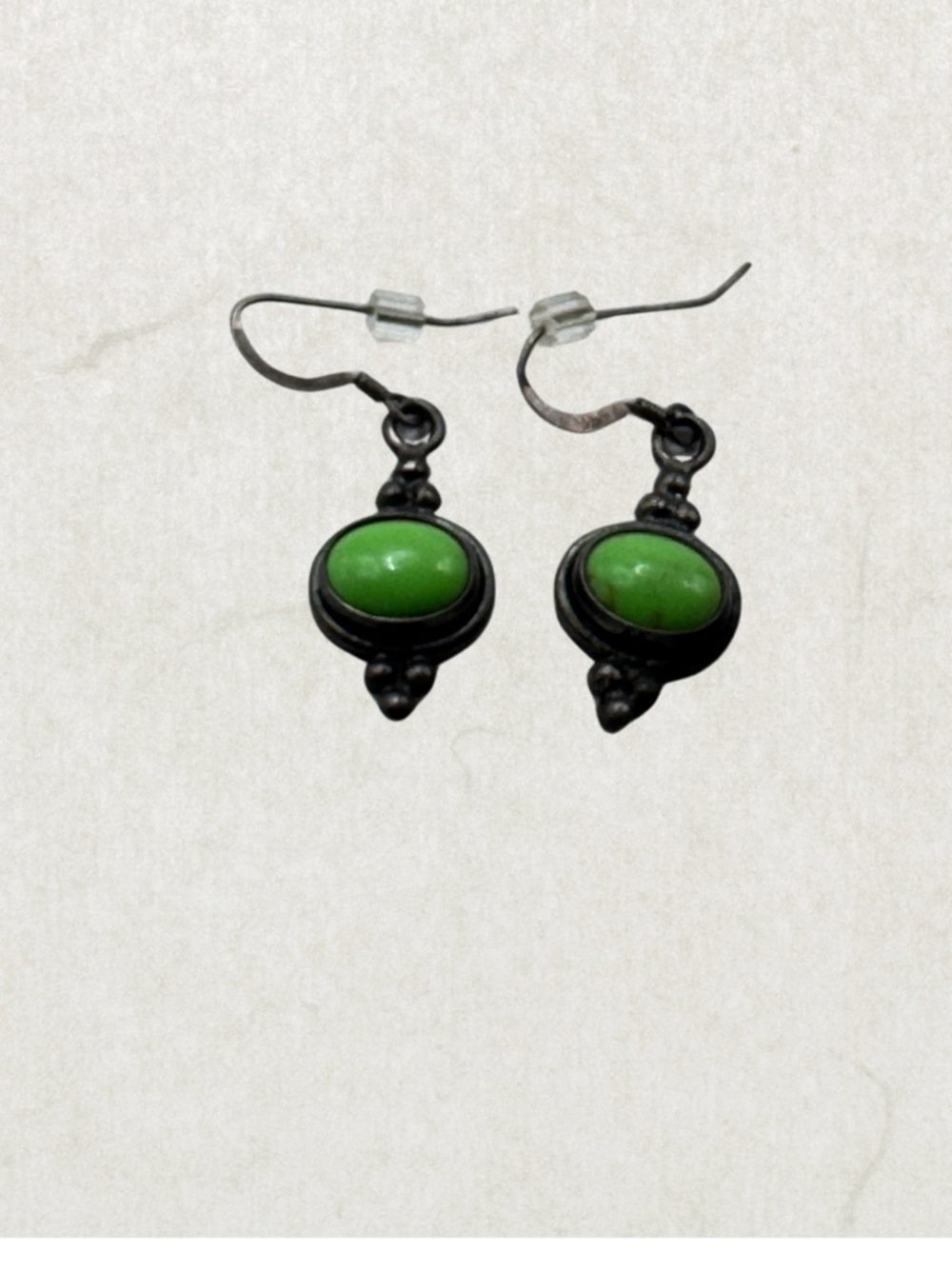 Southwestern or Native American-inspired dangle earrings.